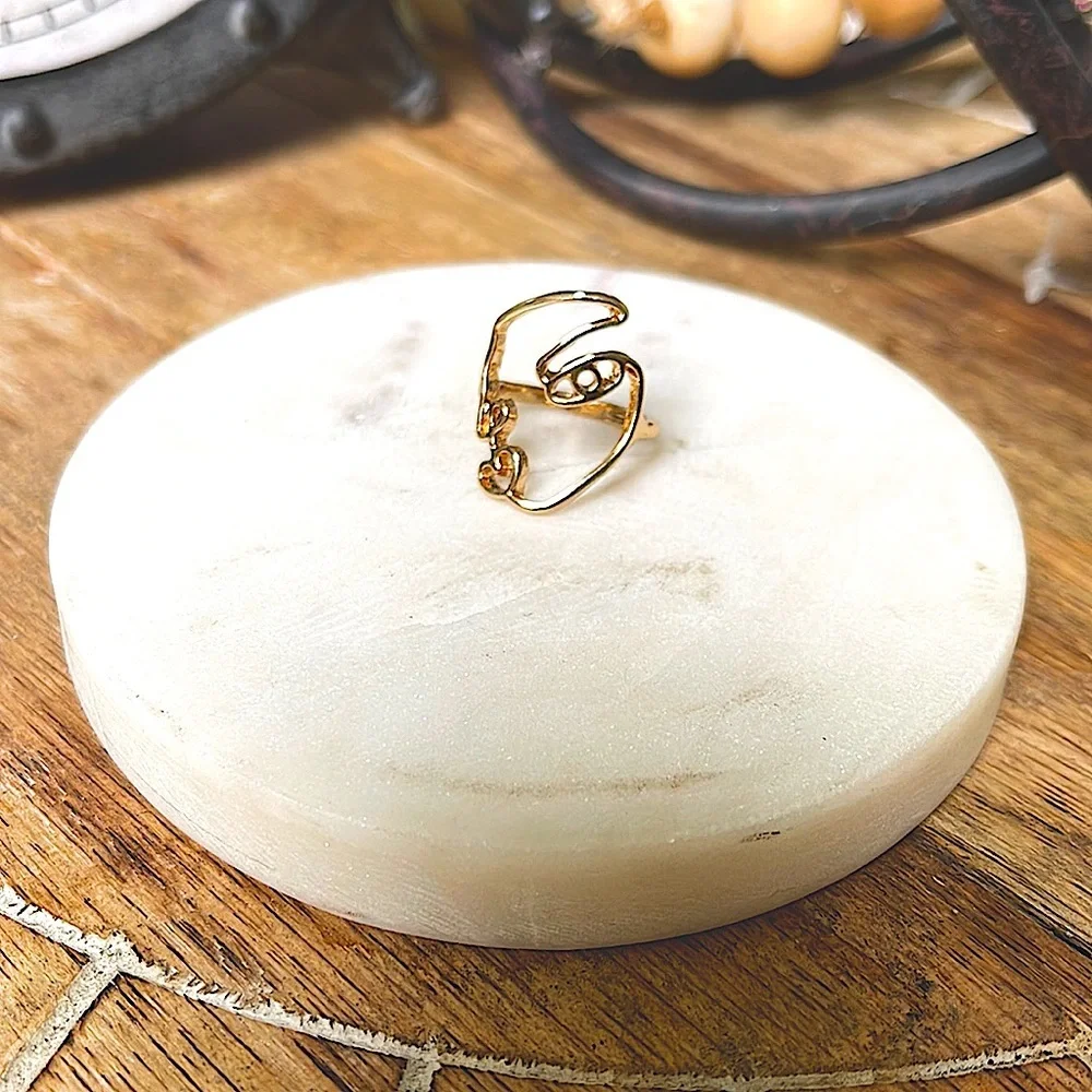 Gold face ring